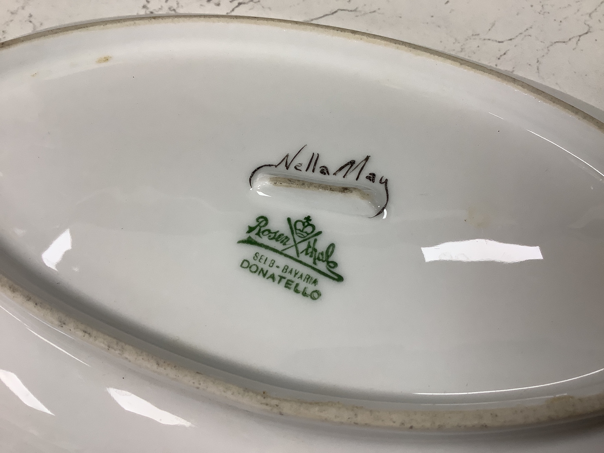 Three Scottish art pottery bowls, two signed Bough, one signed Mak Merry, and a Scottish decorated Rosenthal serving dish